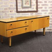 Black-gloved 50s varnished wooden sideboard