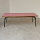 Large canteen table in pink formica and metal.