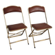 2 golden metal chairs with faux leather in the 60s/70s Opera style.