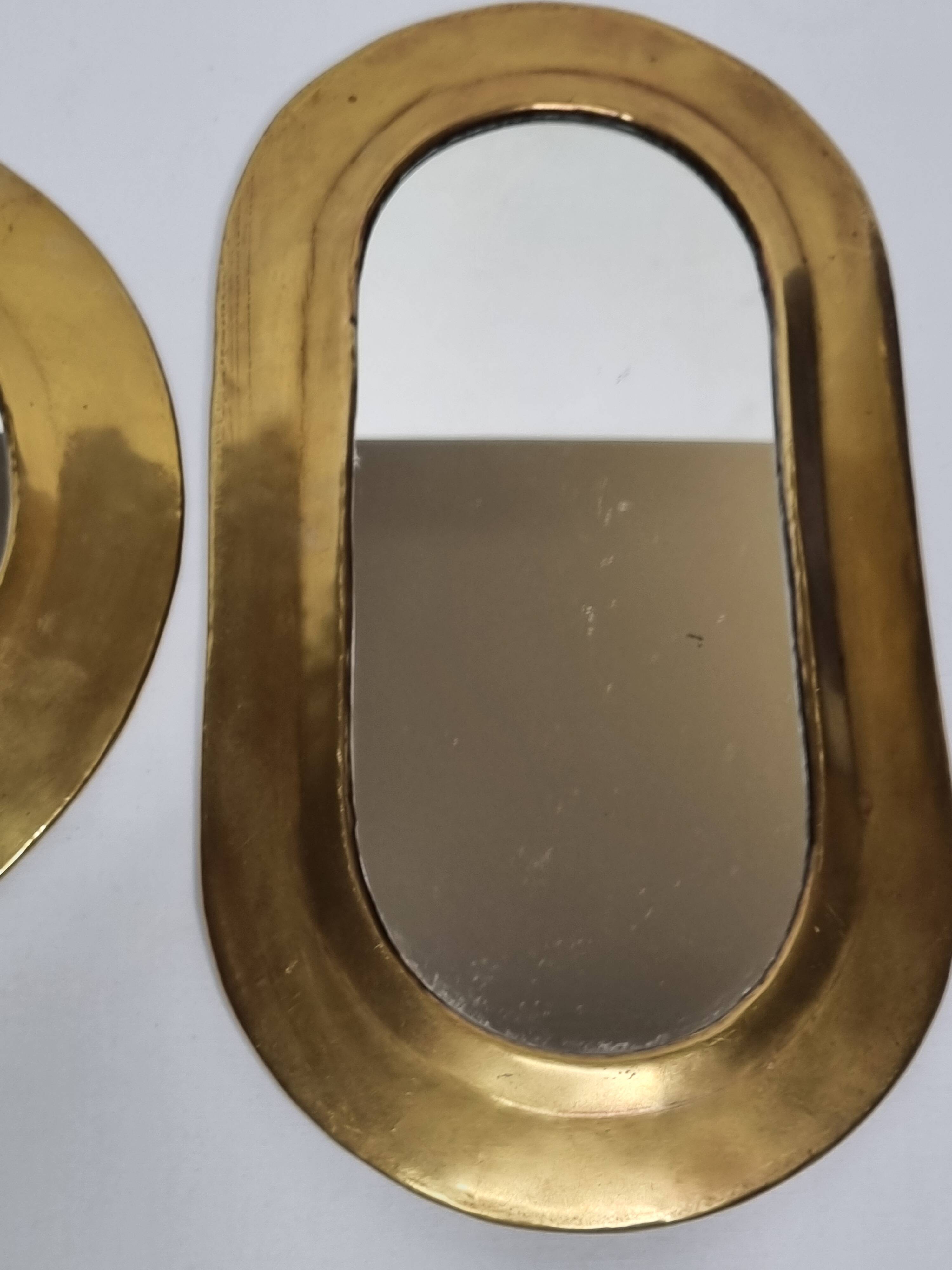 Set of three antique Moroccan brass mirrors, 32 cm