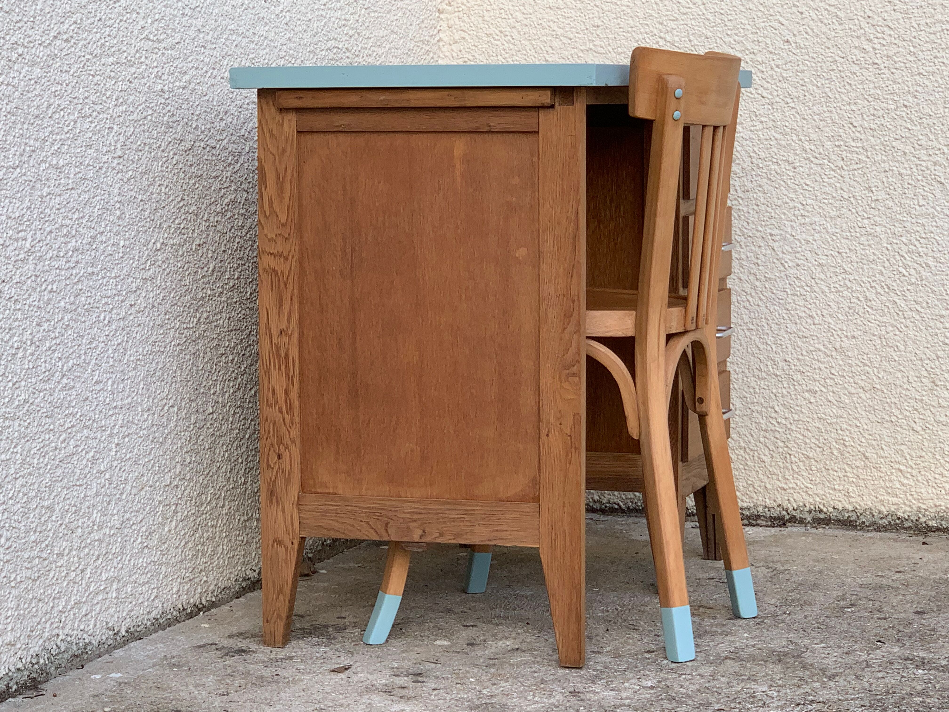 Vintage desk compass feet 1950 and its Baumann chair