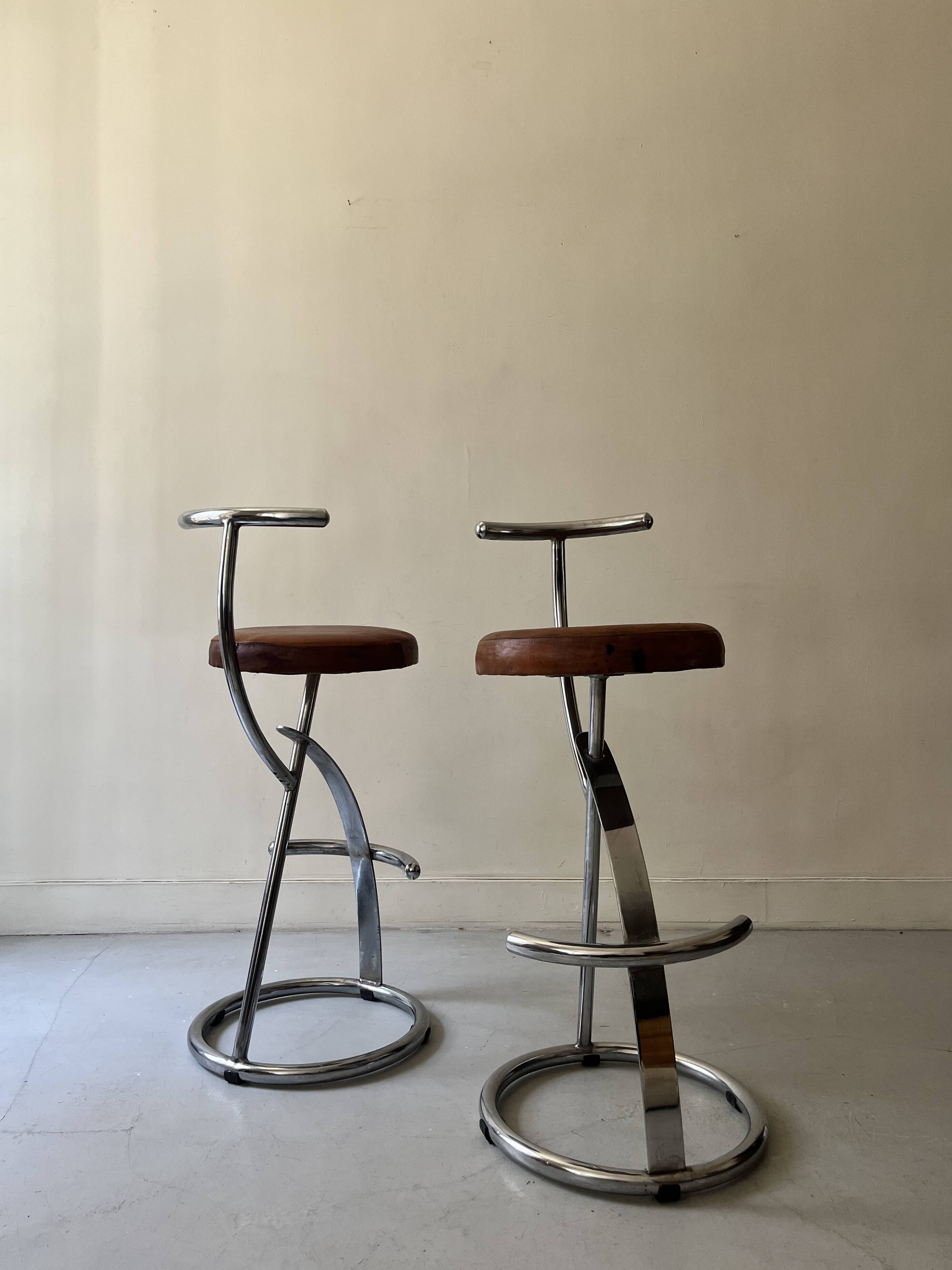 Bar stools in tubular chrome and tan leather, 1970s
