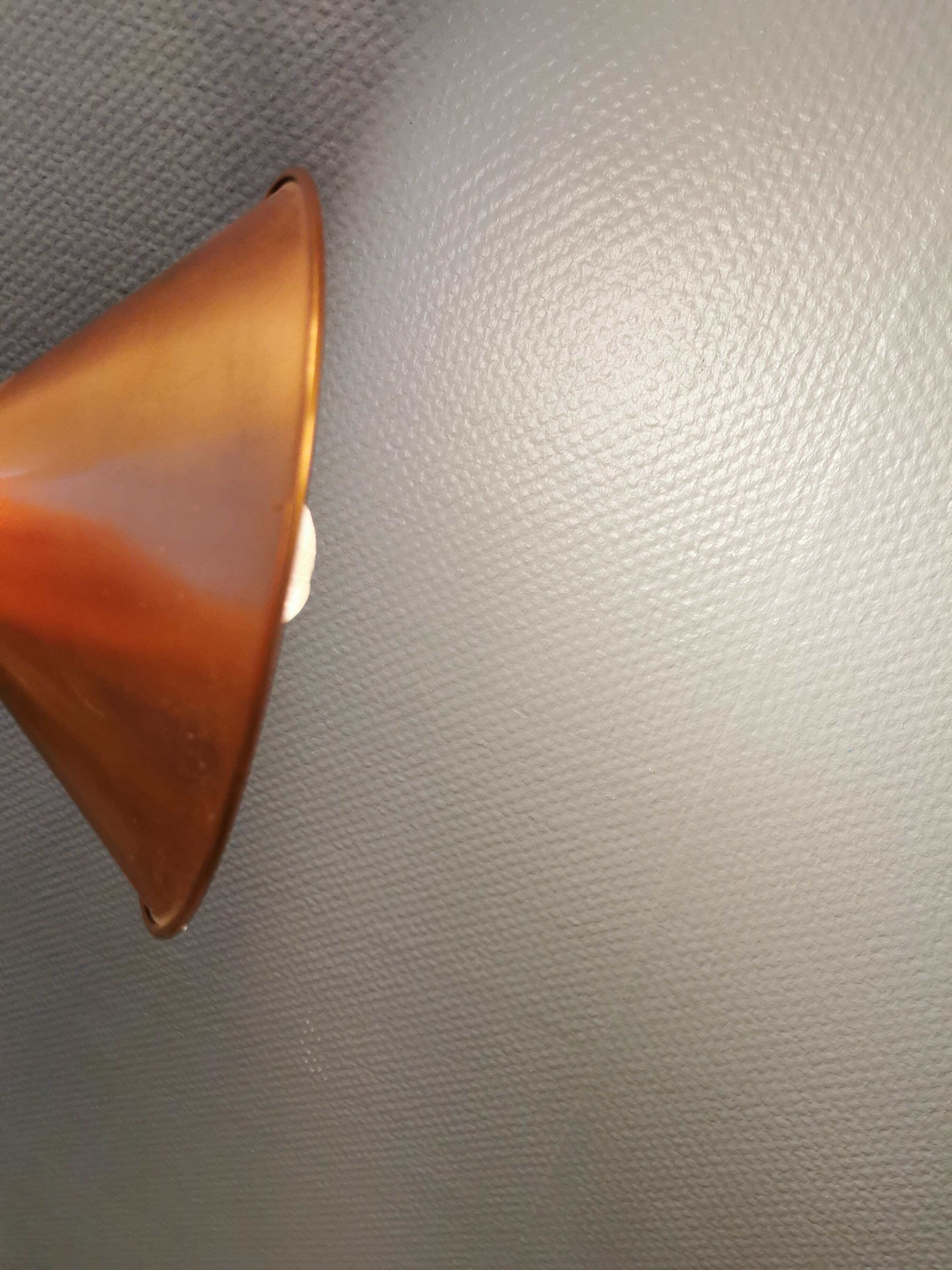 Copper hanging lamp with brass colored top and white inside lacquer.