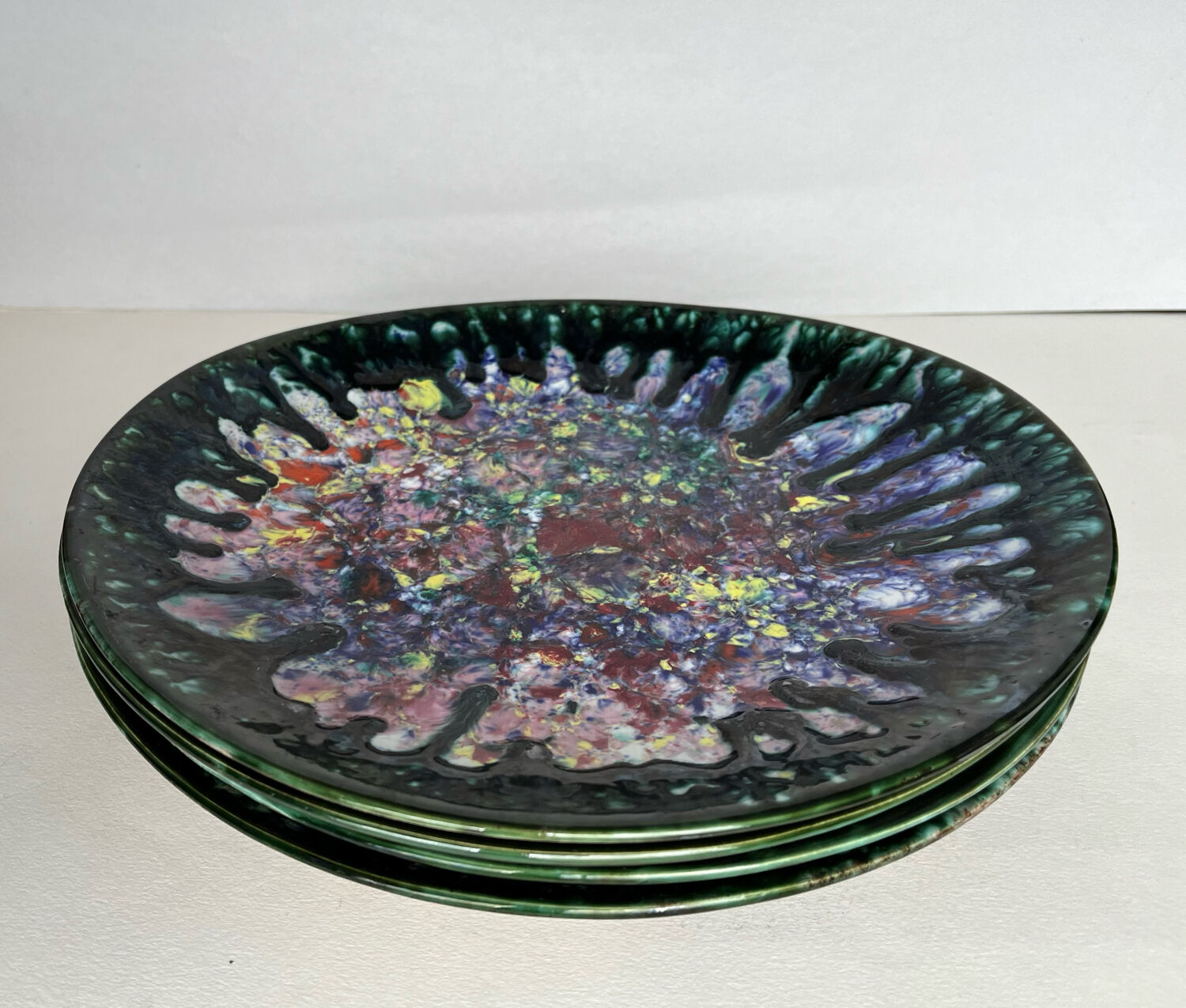 4 oval shaped plates Morvan