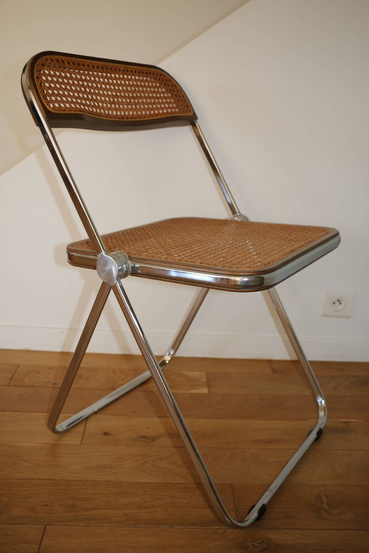2 plia rattan chairs by piretti
