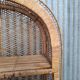 Vintage rattan wicker library in Emmanuelle style