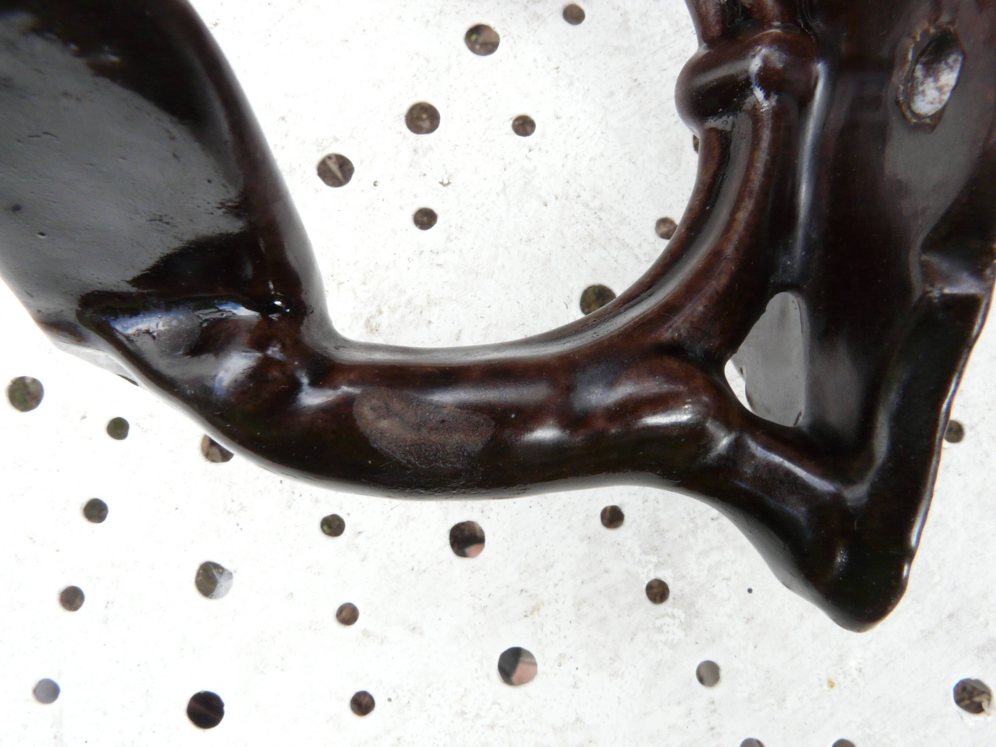 Art Nouveau period coat rack, 1910, in enamelled cast iron, brown