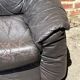 Pair of patinated leather club armchairs