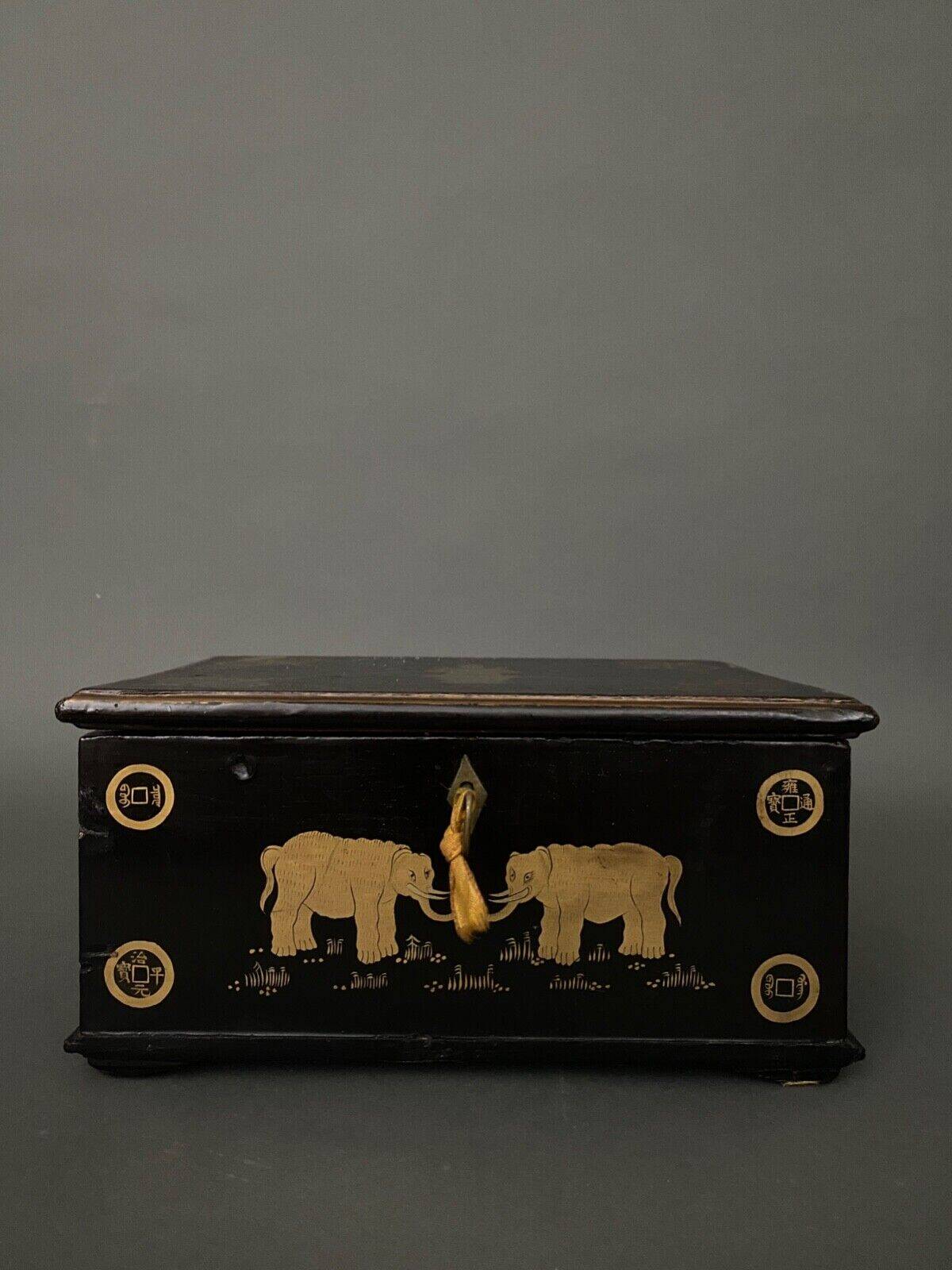 20th century Indian wooden box black lacquer decorated with animals with gold highlights