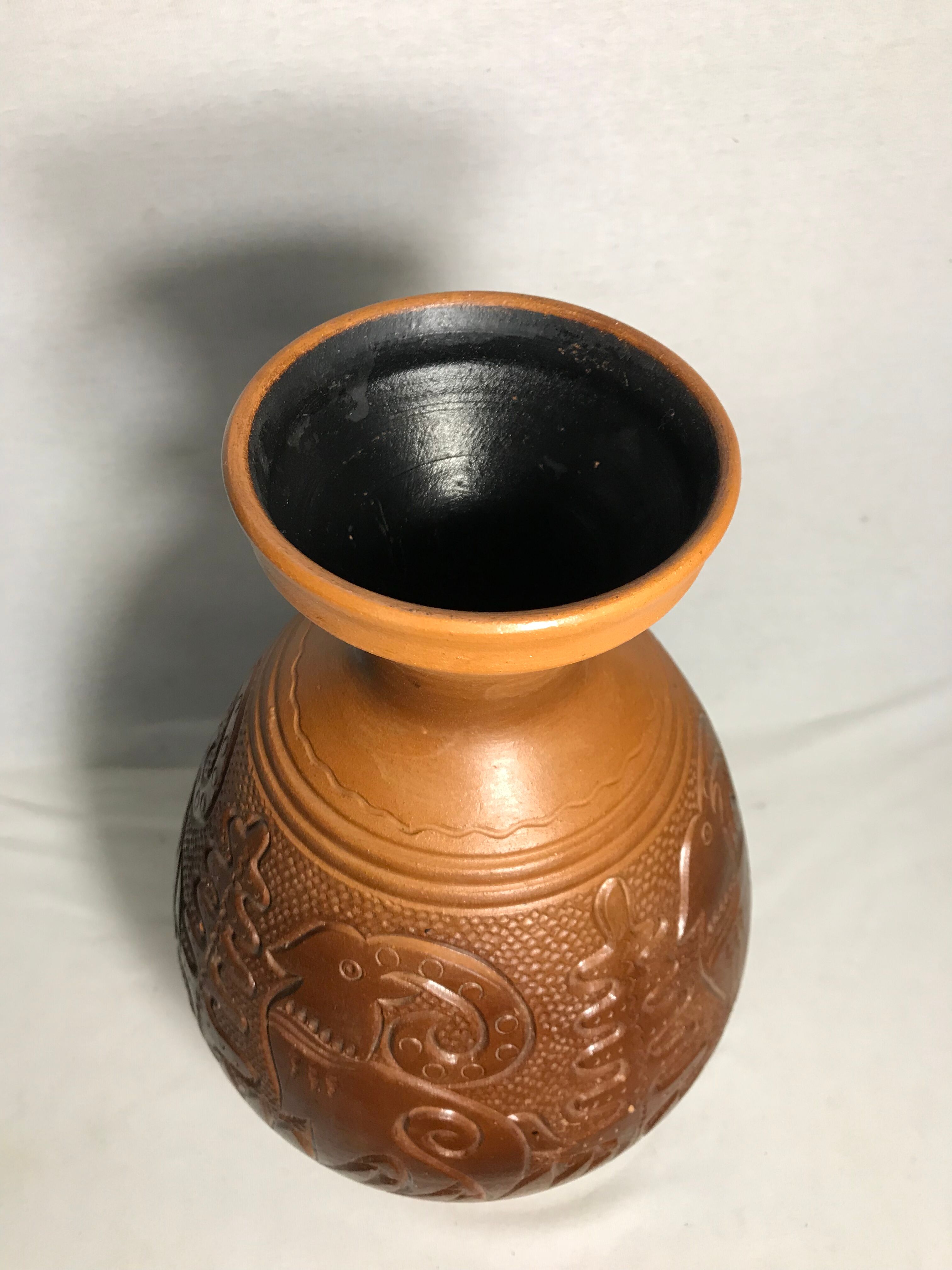 Old terracotta vase carved interior black vintage