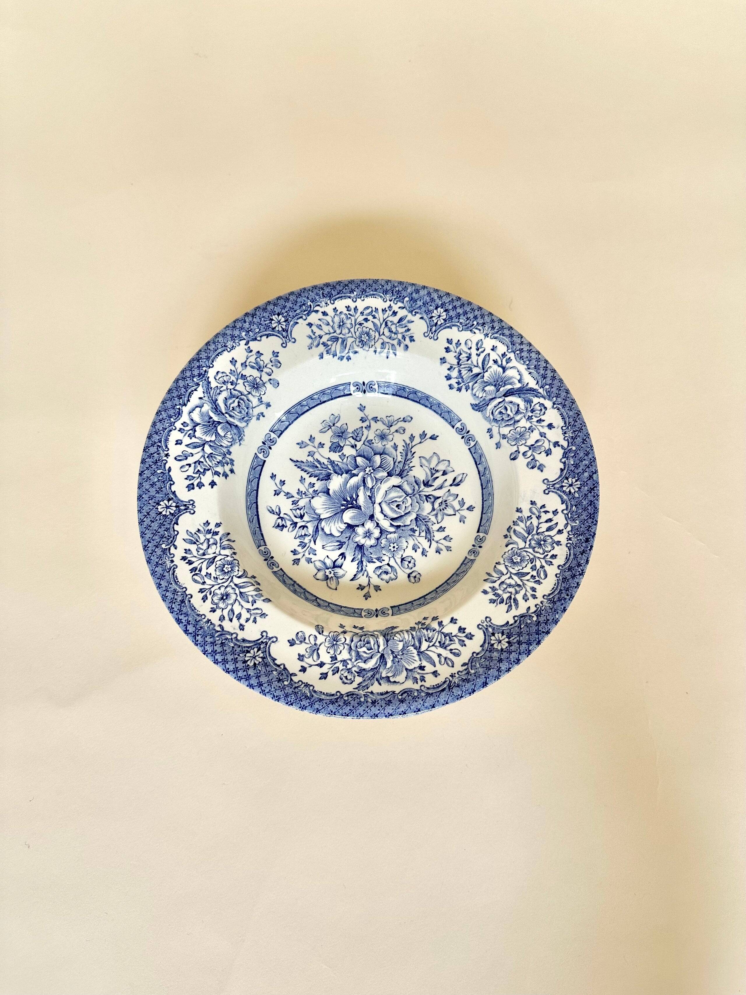 Set of six English deep plates, made of ironstone ceramic, floral patterns.