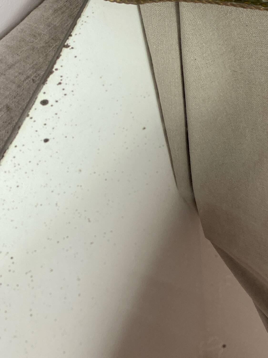 Antique wooden mirror with an unusual shape