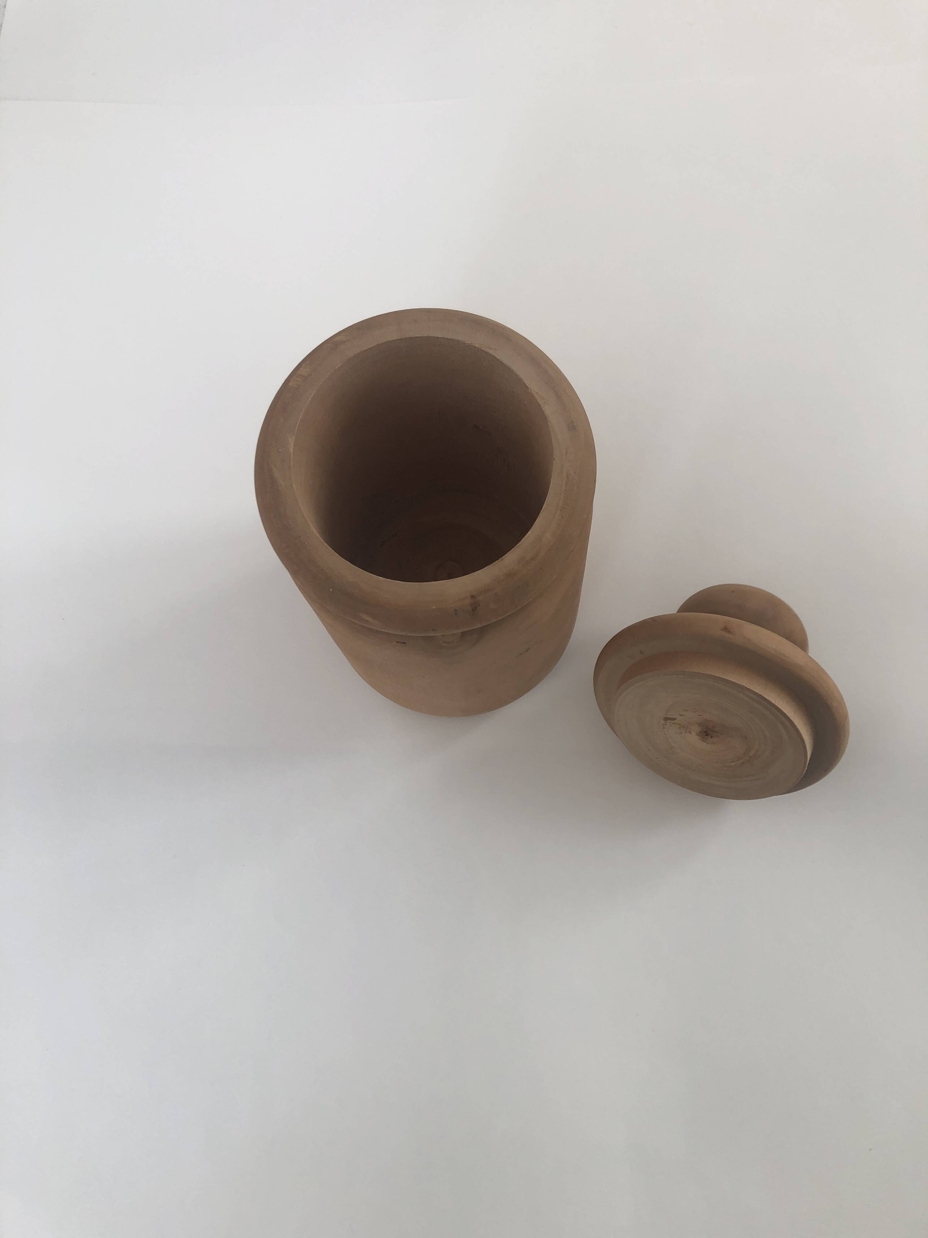 large pot with turned wooden lid