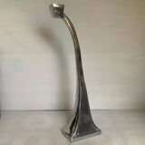 Large silver metal candlestick in the style of Xavier Lust