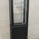 Old two-door shop showcase with black patina