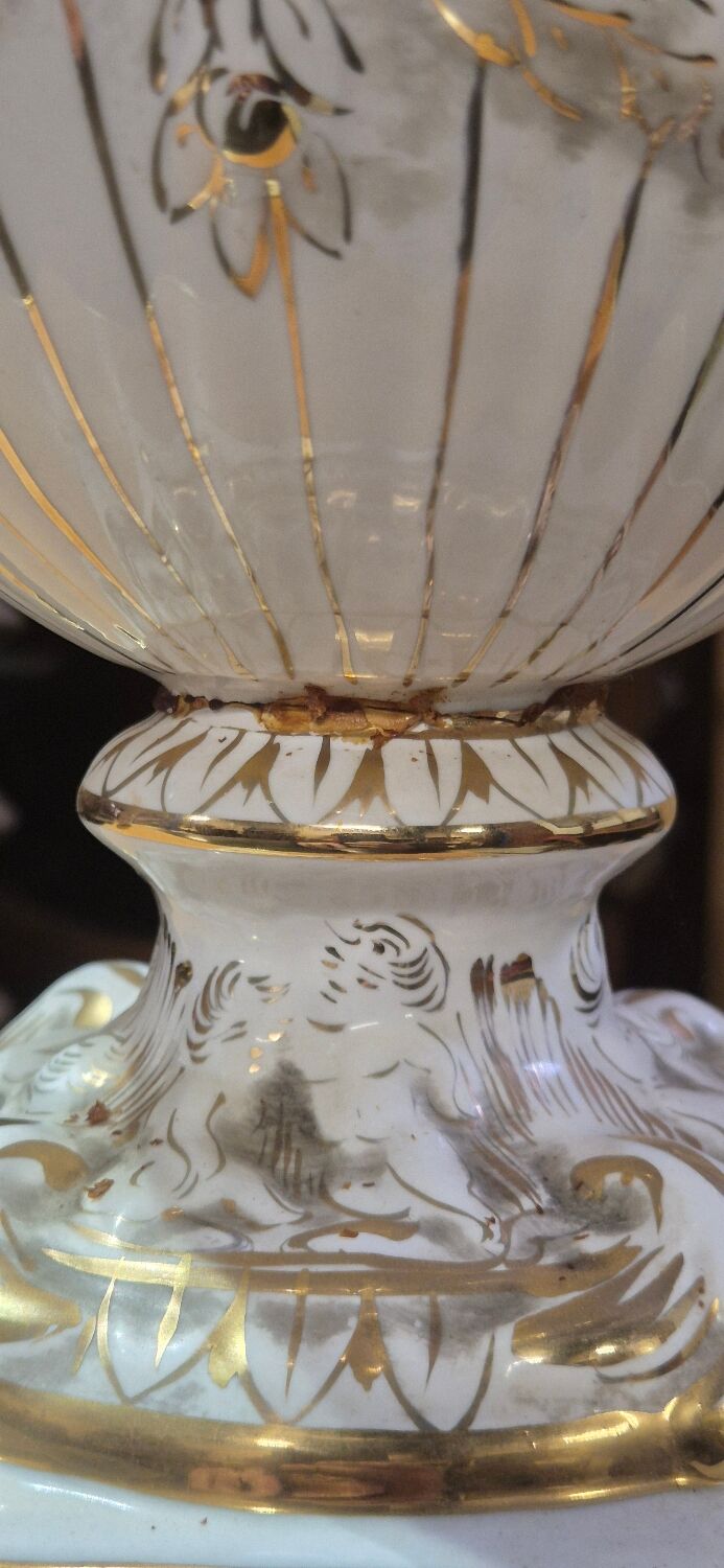 Italian coffee table with glass top, wooden base, and porcelain legs