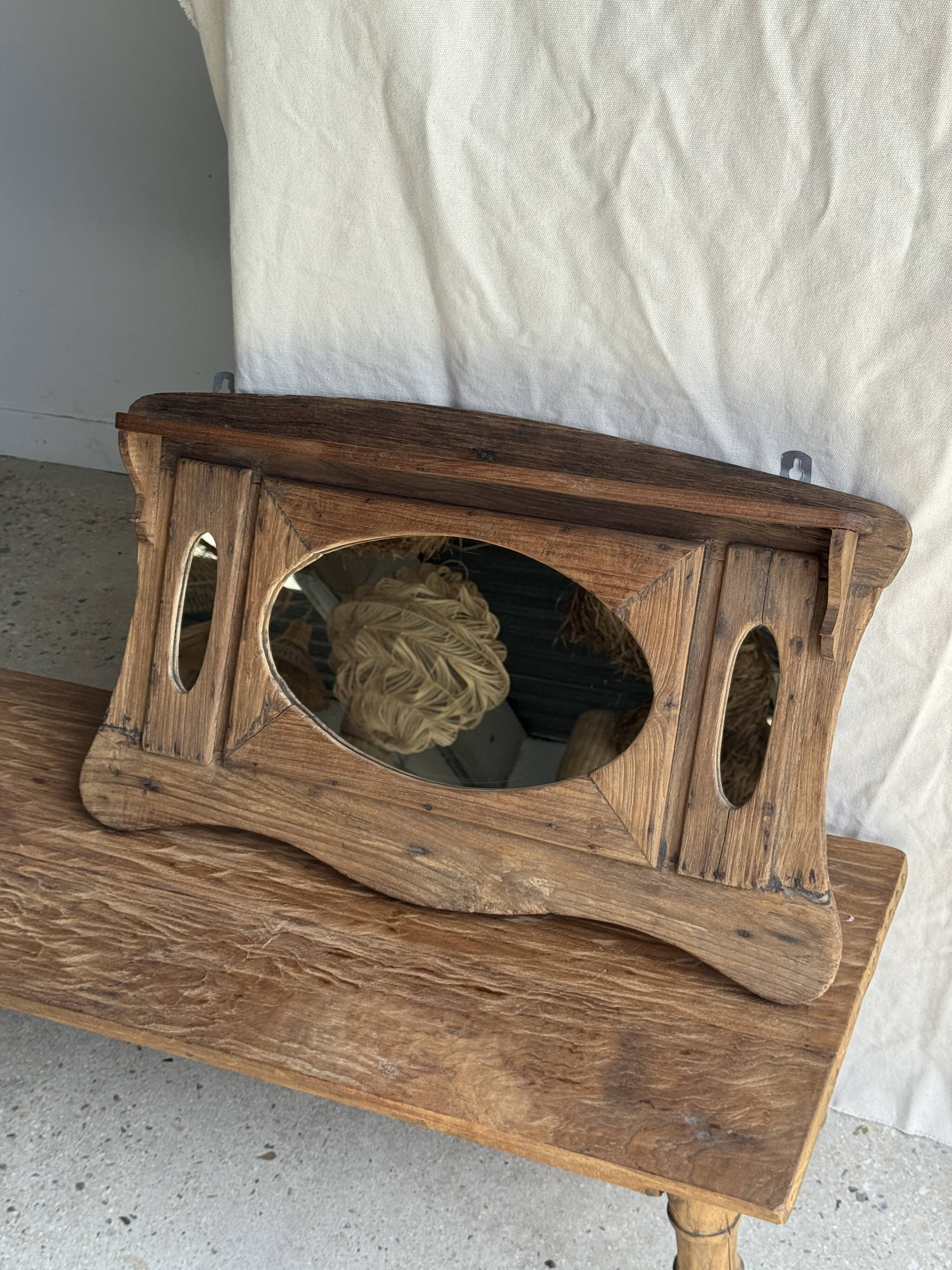 Small wall mirror in organic old Indonesian teak 75x45.