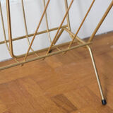 Vintage magazine holder in gold metal