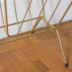 Vintage magazine holder in gold metal