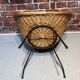 Wicker and metal armchair