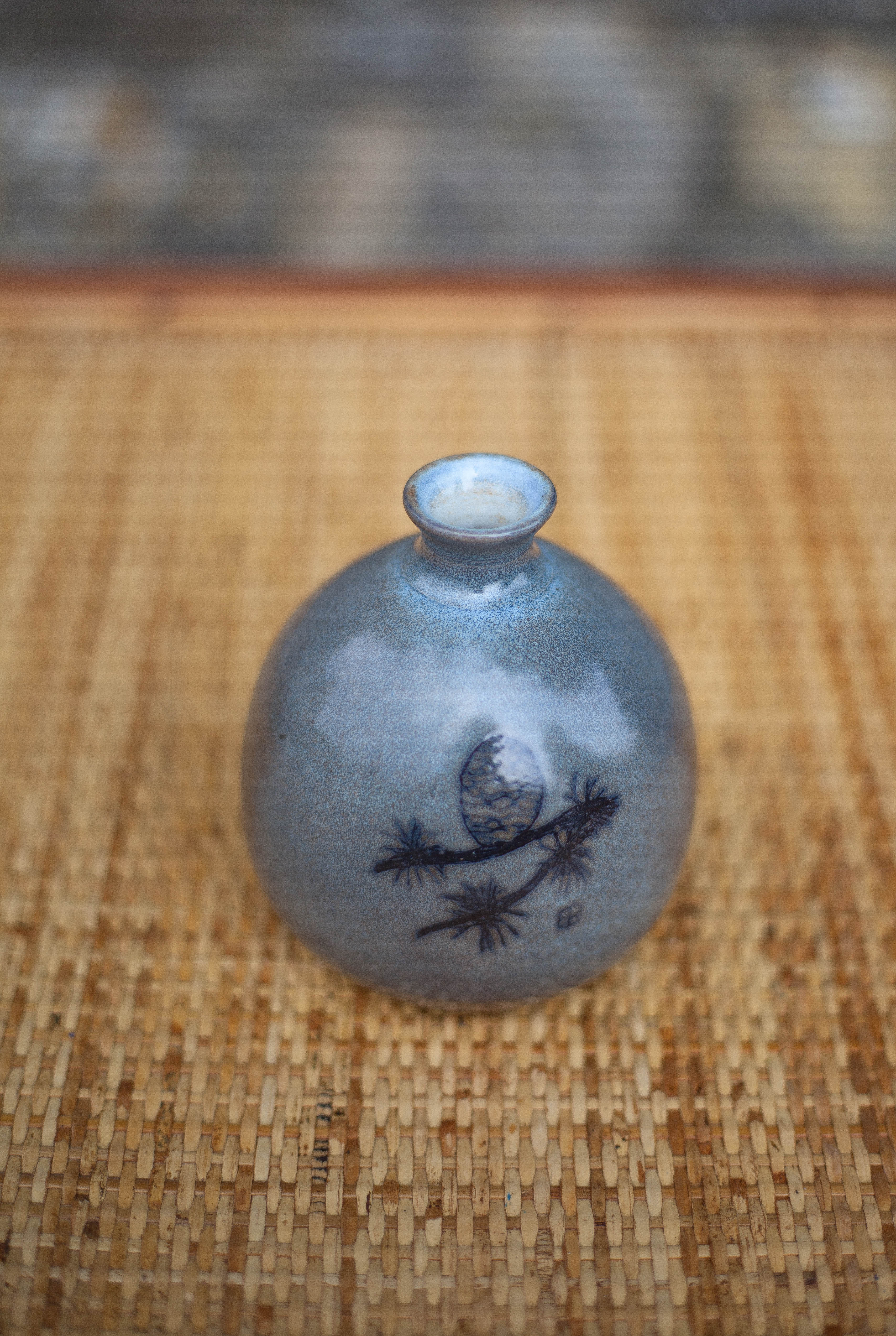 Glazed terracotta ball vase