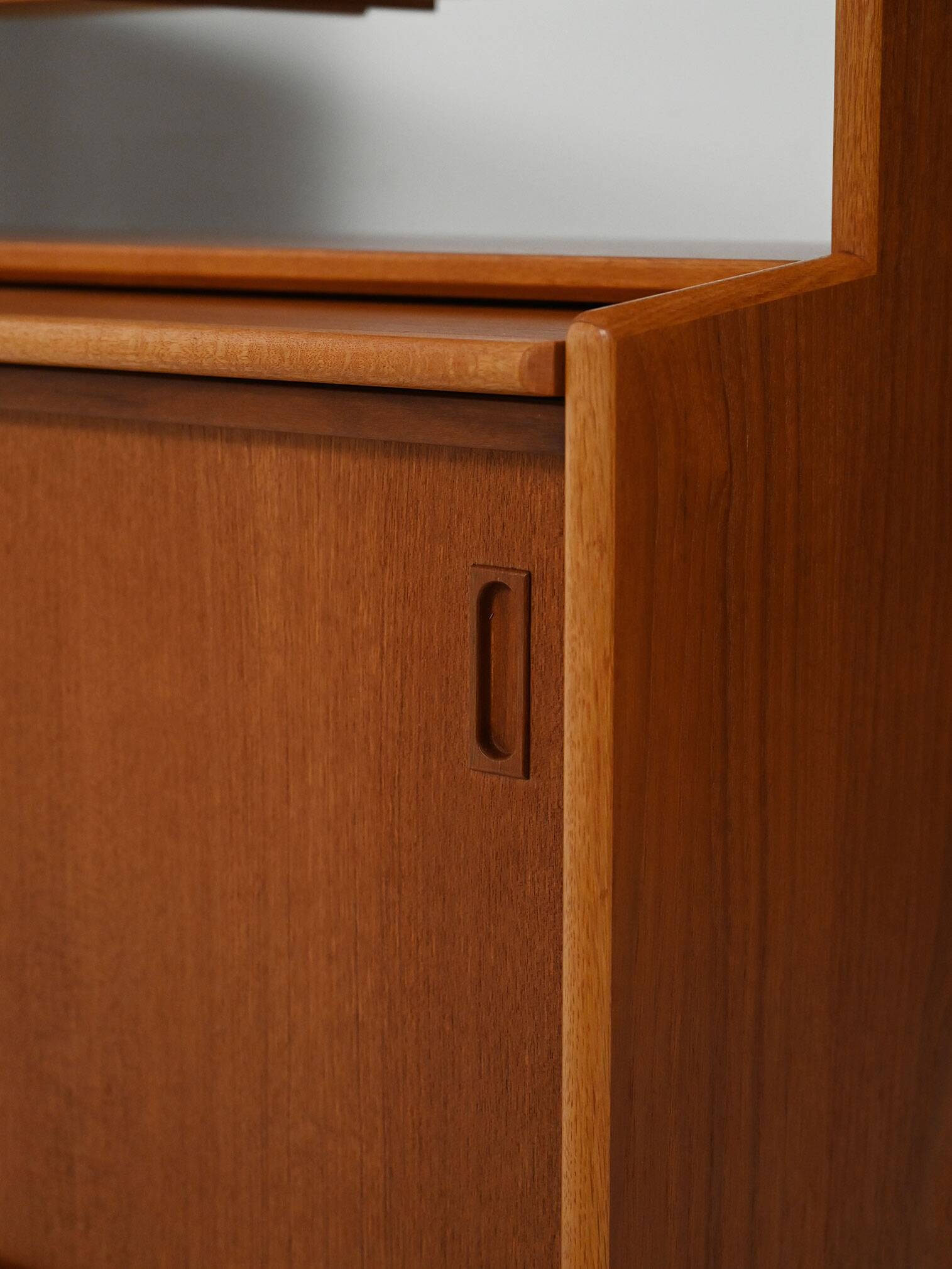 Scandinavian teak bookcase with suspended drawers