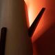 Vintage wall lamp from the 60s, teak and mid-century metal.