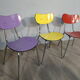 3 colored formica chairs