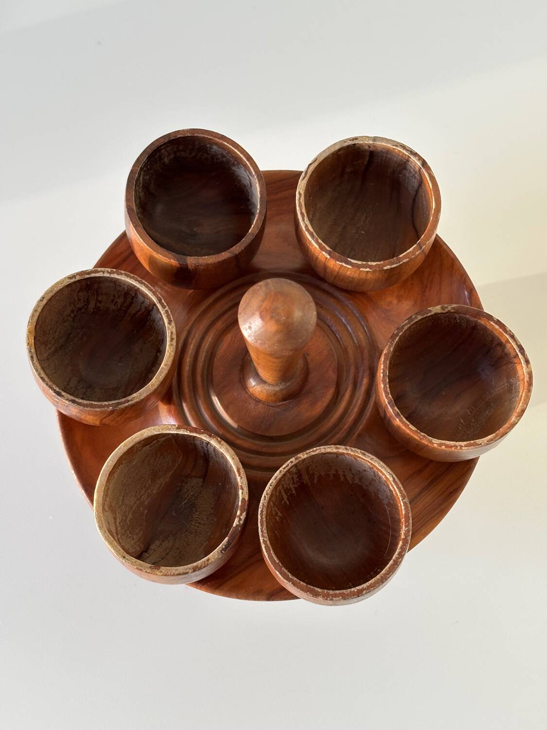 Wooden egg cups on a stand