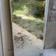 Large vintage mirror with bevelled glass.