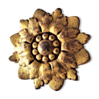 Nail cover in gilded brass in the shape of a rosette from the 19th century