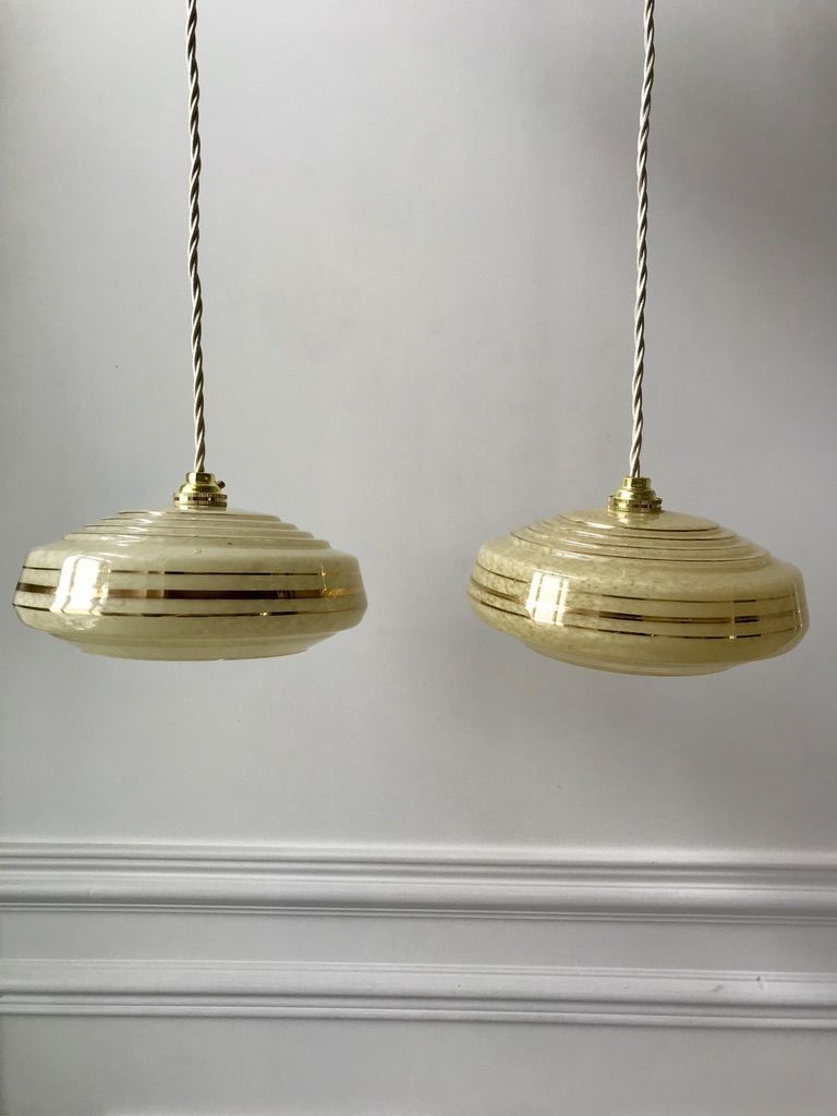 Pair of suspensions in yellow Clichy glass and golden border 40s-50s