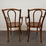 Pair of curved wooden bistro armchairs