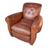 Old leather club armchair, circa 1940 art deco style