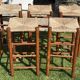 5 Charlotte Perriand-style wooden and straw bar stools