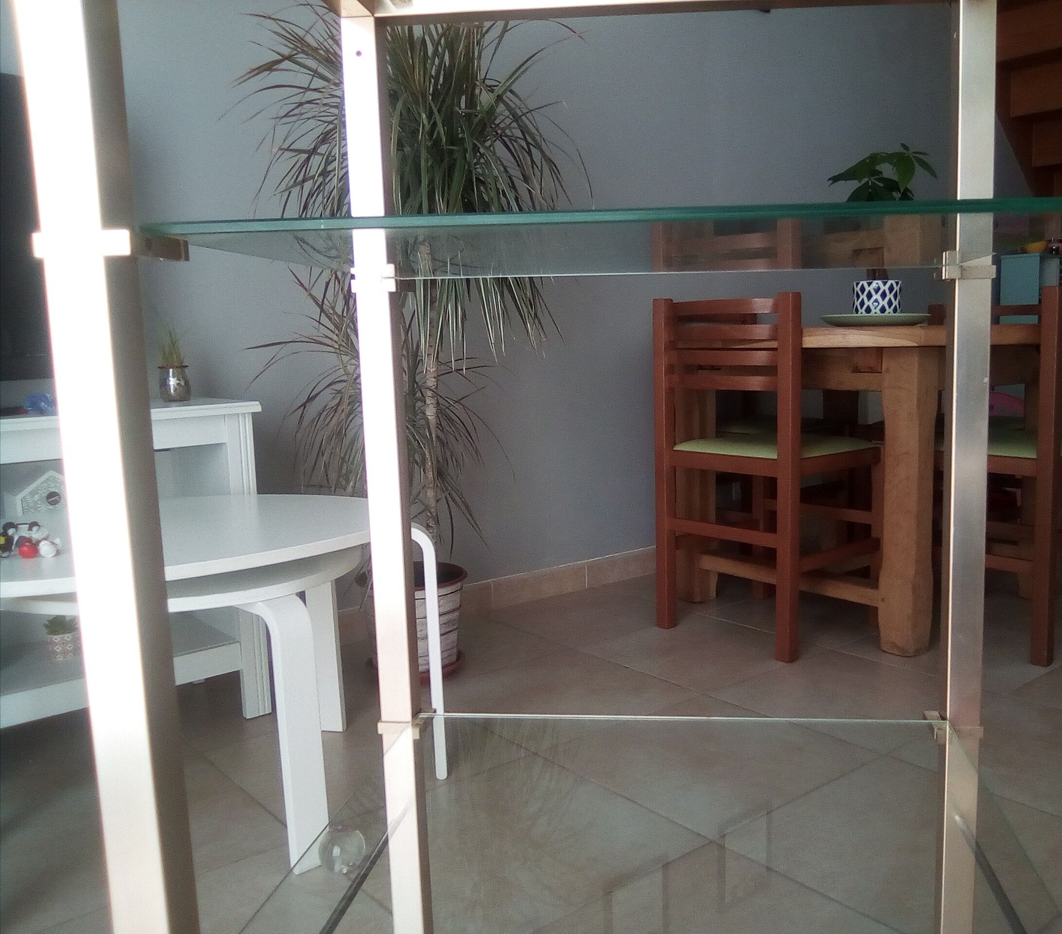 Brass shelf and glass on wheels Pierre Vandel
