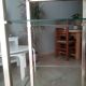 Brass shelf and glass on wheels Pierre Vandel