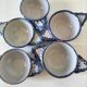 5 mini earthenware bowls from Charolles decorated with a village and rooster.