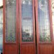 Late 19th century store doors, haberdashery front with Art Nouveau stained glass windows
