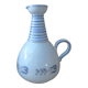 Vintage blue ceramic jug with hand-painted floral decoration.