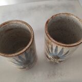 Two vases rolls decorated with thistles, signed