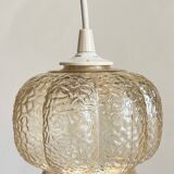 Small glass ball pendant light with amber plant effect