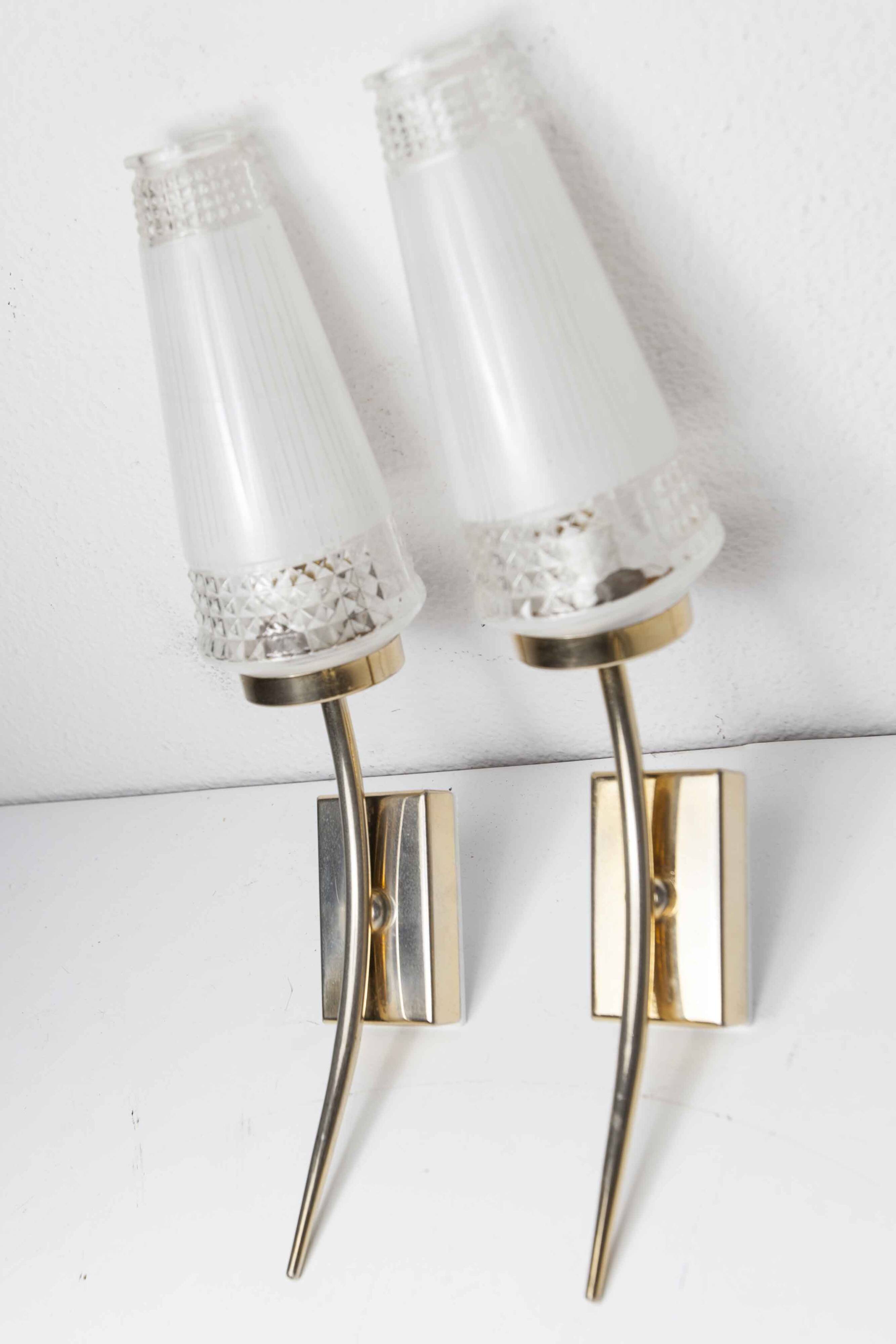 Pair of brass and white and transparent glass wall lights 1960
