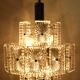 Vintage metal chandelier and carved glass