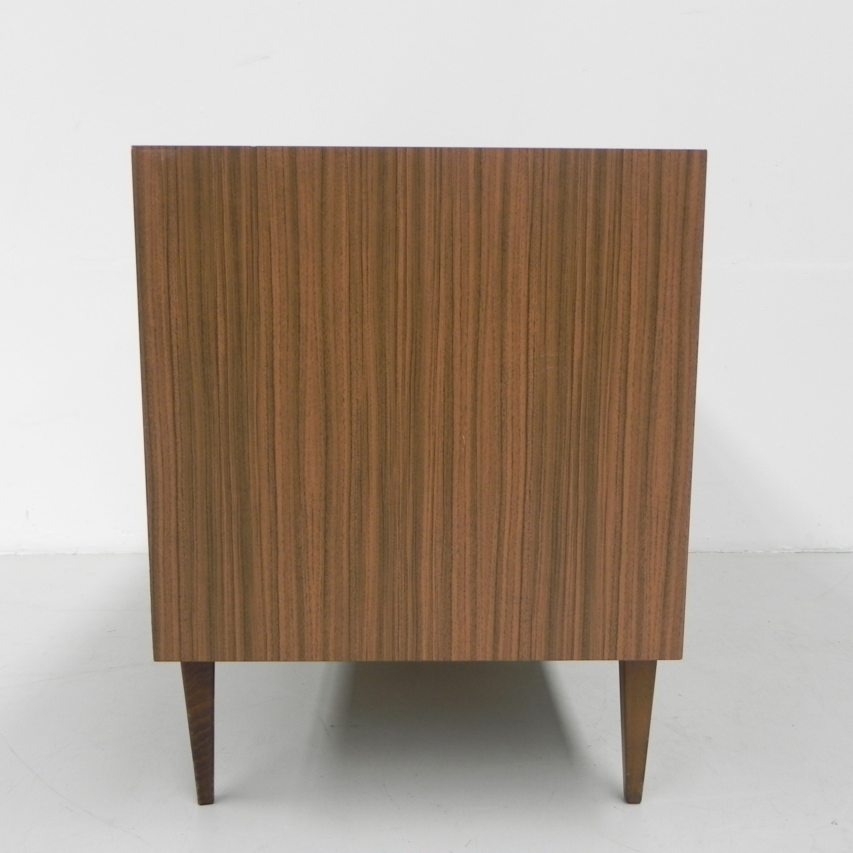 Vintage chest of drawers on tapered legs