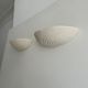 Pair of wall lamps in molded plaster France 1980
