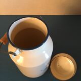Enamelled milk jar retro style ecru color with "goose" patterns. Wooden handle.