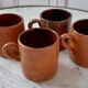 Set of 4 mugs in glazed sandstone 70s