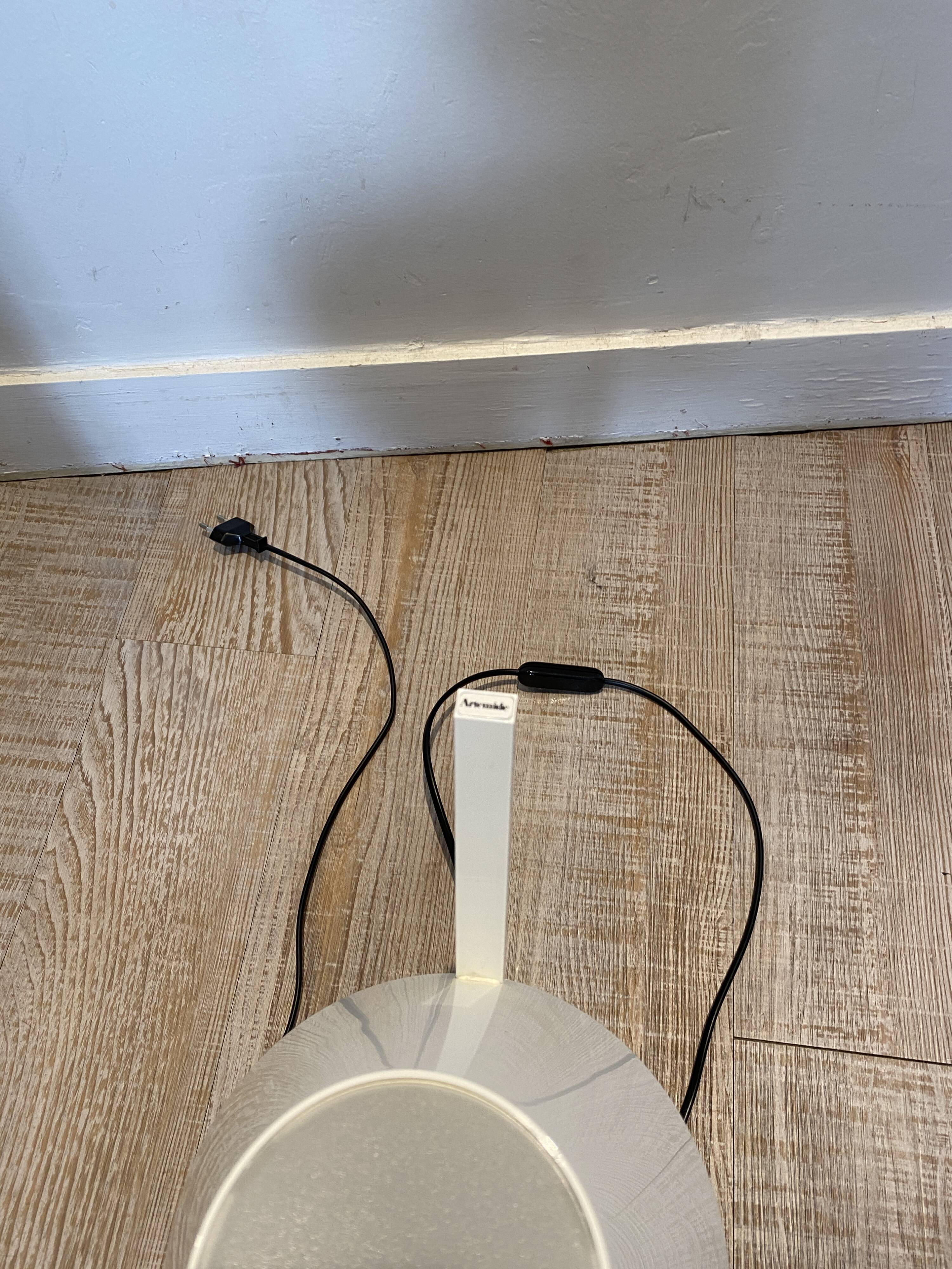 White Artemide lamp