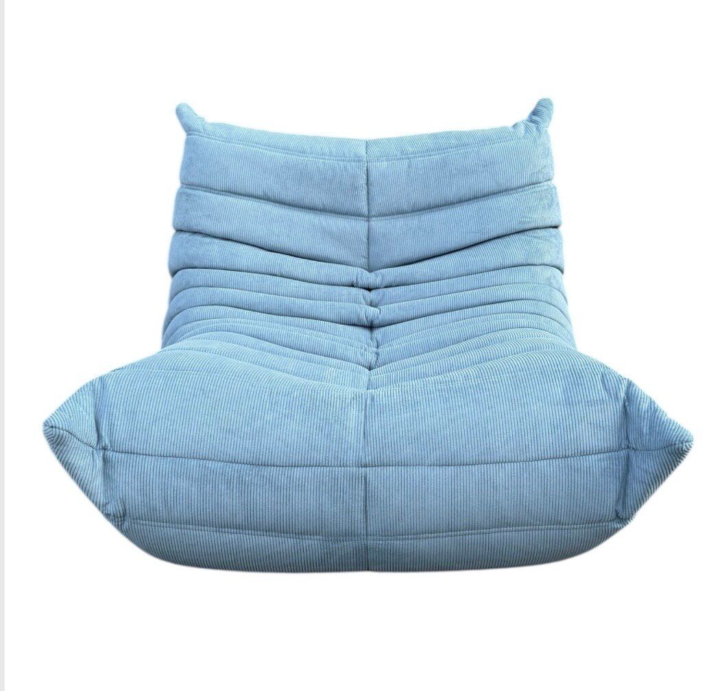 Togo lounge chair in light blue corduroy by Michel Ducaroy for Ligne Roset